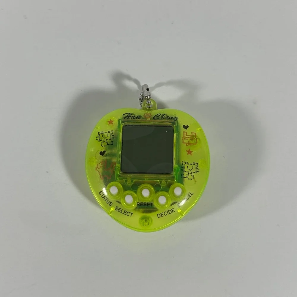 Han Cheng Virtual Pet Handheld Game Neon Lime Green Heart Translucent Retro Toy